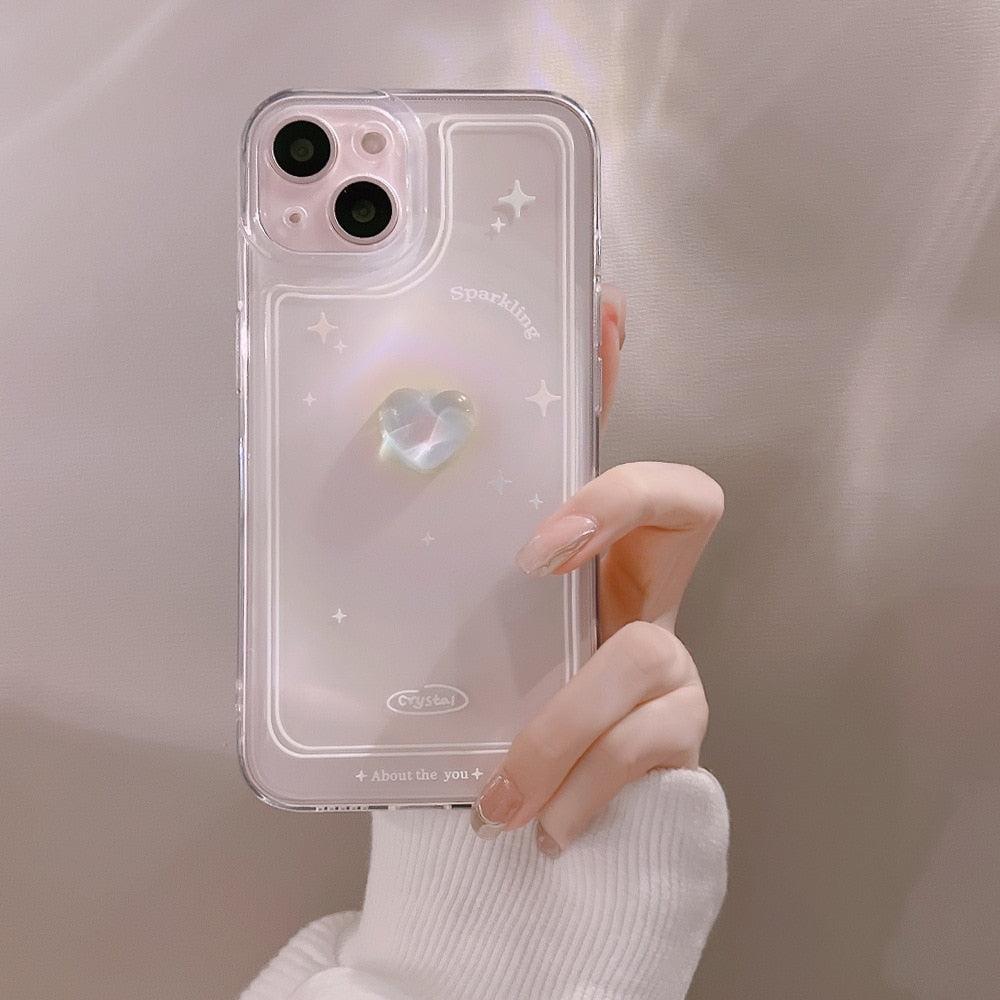 A chic iPhone case by TALISHKO, showcasing a 3D heart and delicate star accents.