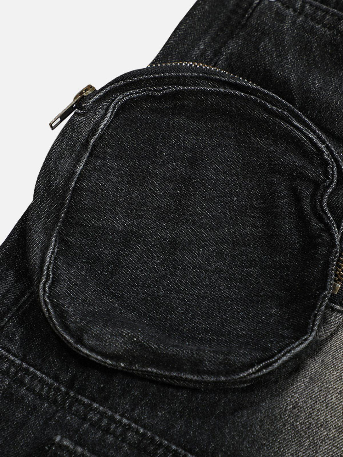 Intricate look at TALISHKO's 3D multi-pocket design, highlighting the textured denim craftsmanship.