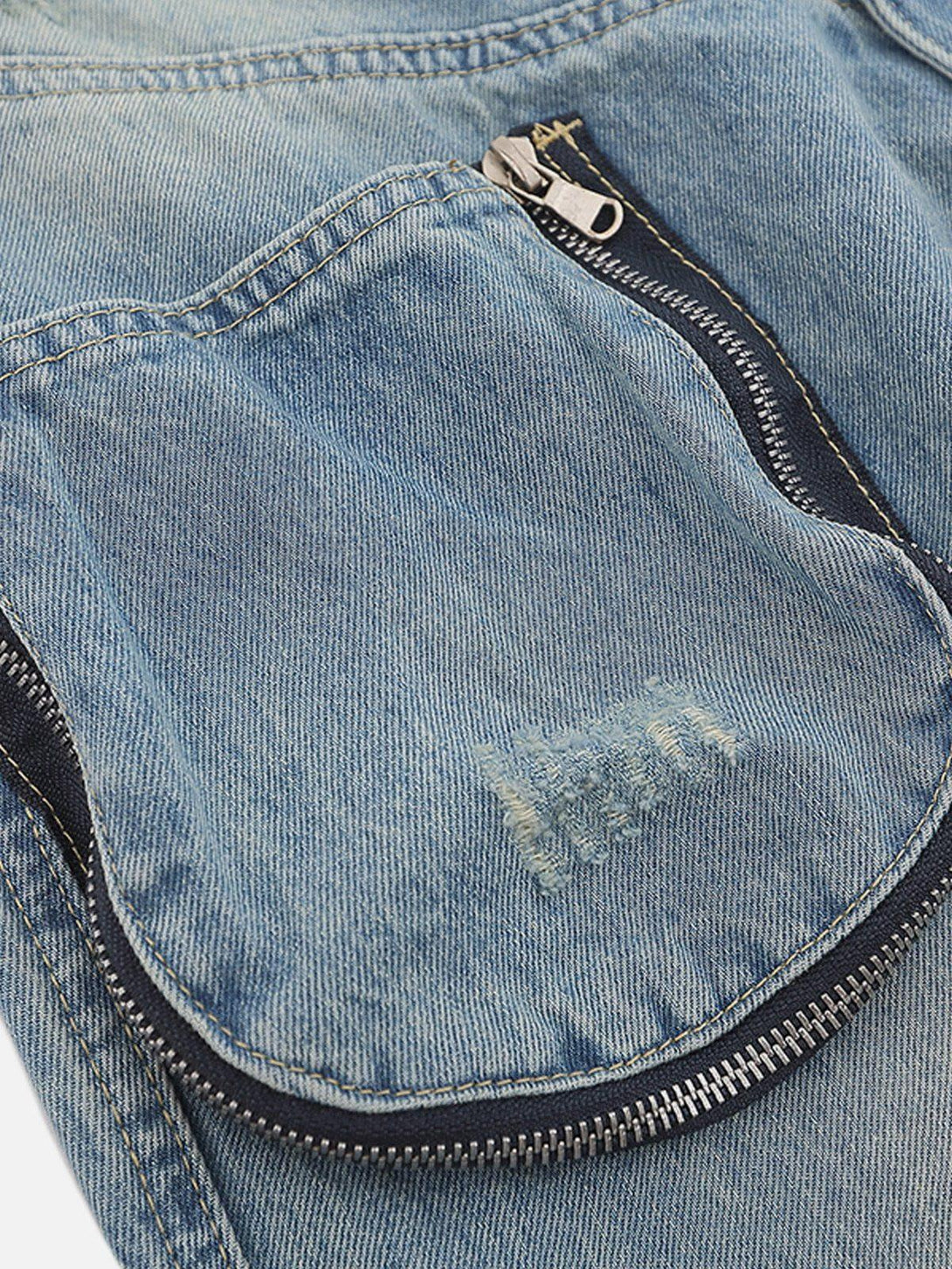 Detailed view of TALISHKO jeans showcasing the 3D zip-up pocket and distressed detailing.