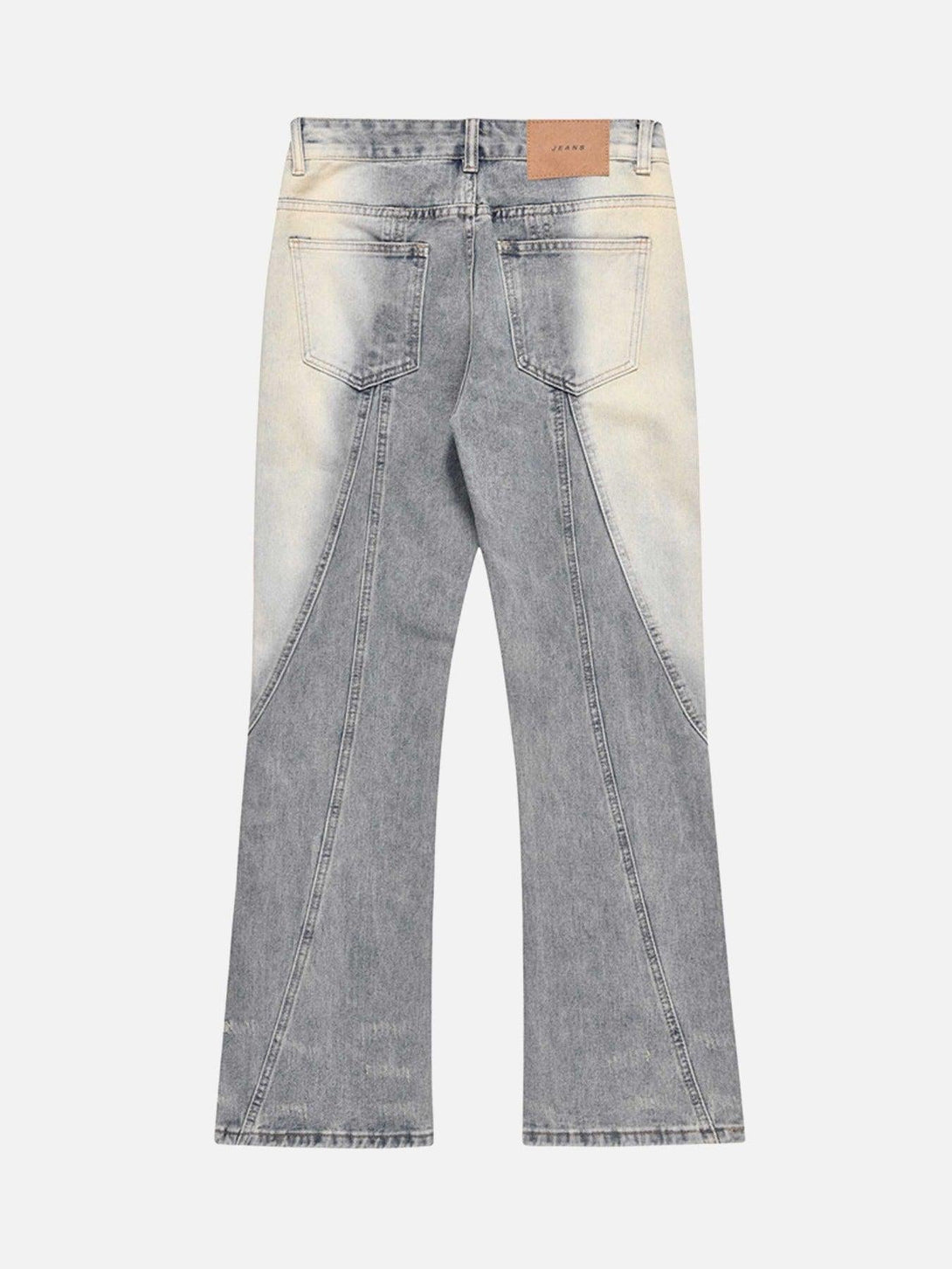 Back view of TALISHKO acid wash spray baggy jeans, highlighting unique stitching detail.