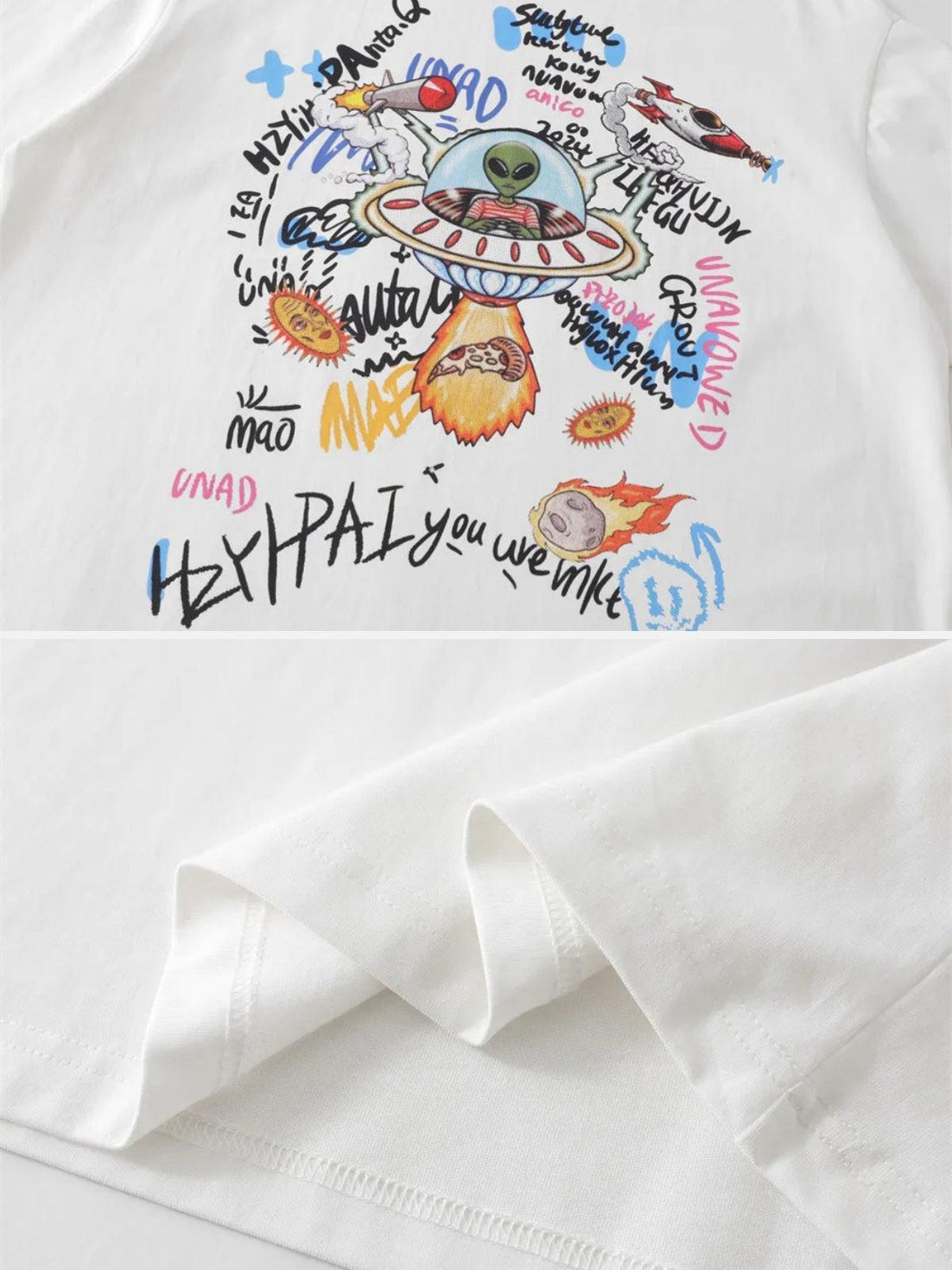 A detailed look at the playful graphic design on a white Alien Encounter Tee by TALISHKO.