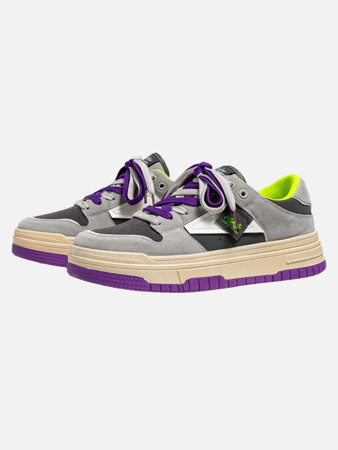 Stylish sneakers by TALISHKO featuring vibrant purple accents and a contrasting color design.