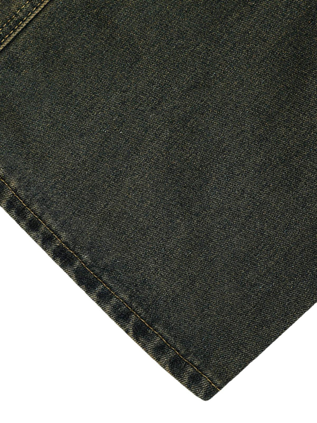 Intricate look at TALISHKO's washed jeans fabric and stitching, emphasizing workwear style.