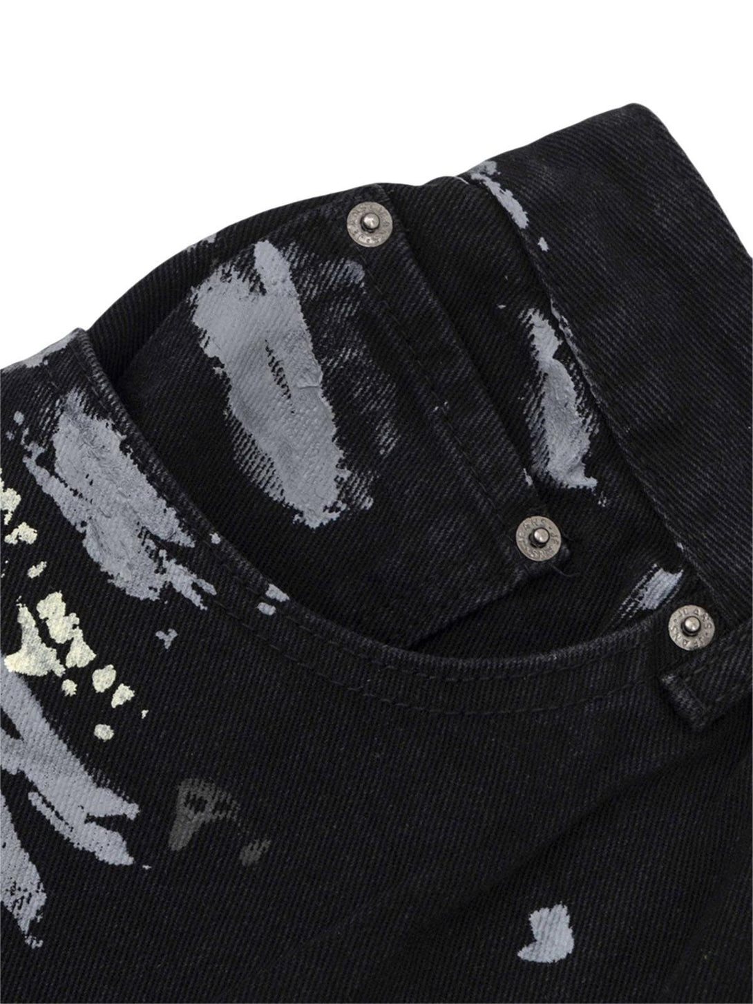 Detailed fabric and stitching on TALISHKO jeans, featuring unique graffiti-inspired patterns.