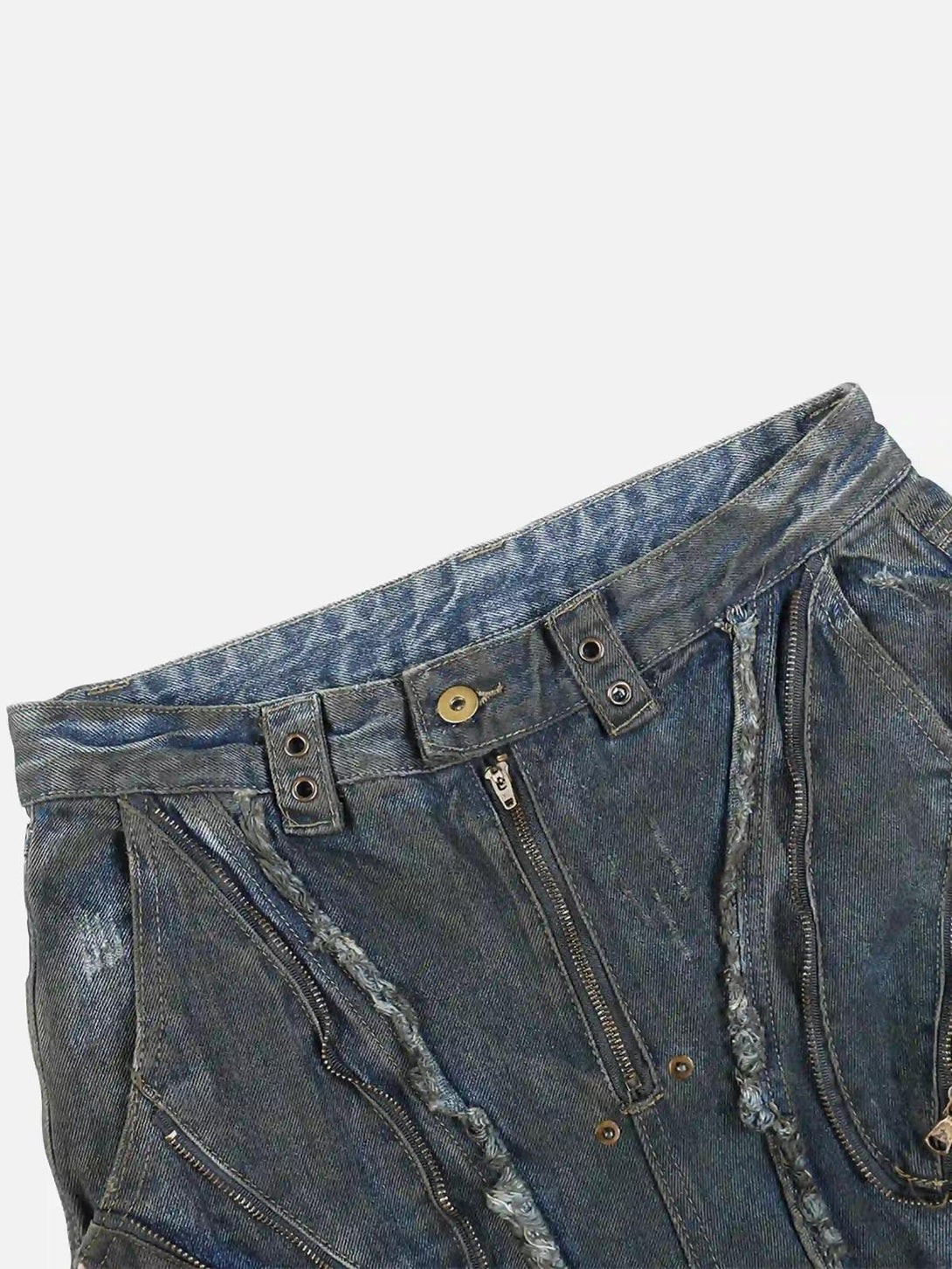 Intricate look at TALISHKO jeans with distressed zippers and rugged details in a wasteland style.