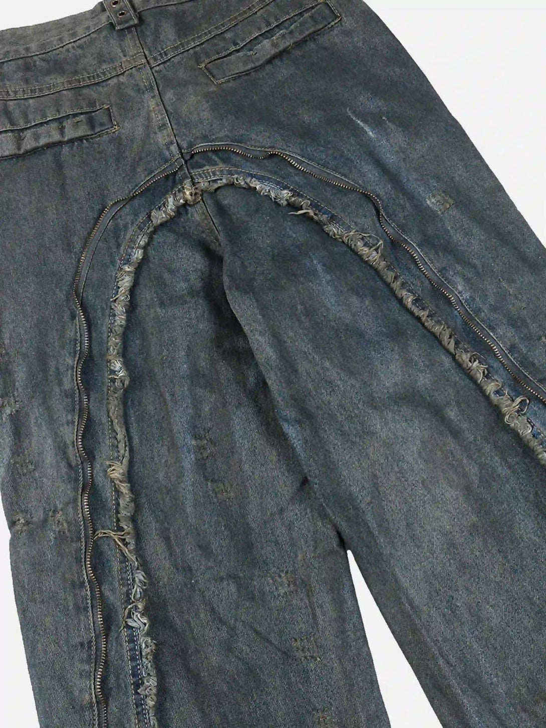 Rugged TALISHKO work jeans with distressed zippers and unique wasteland-style details.