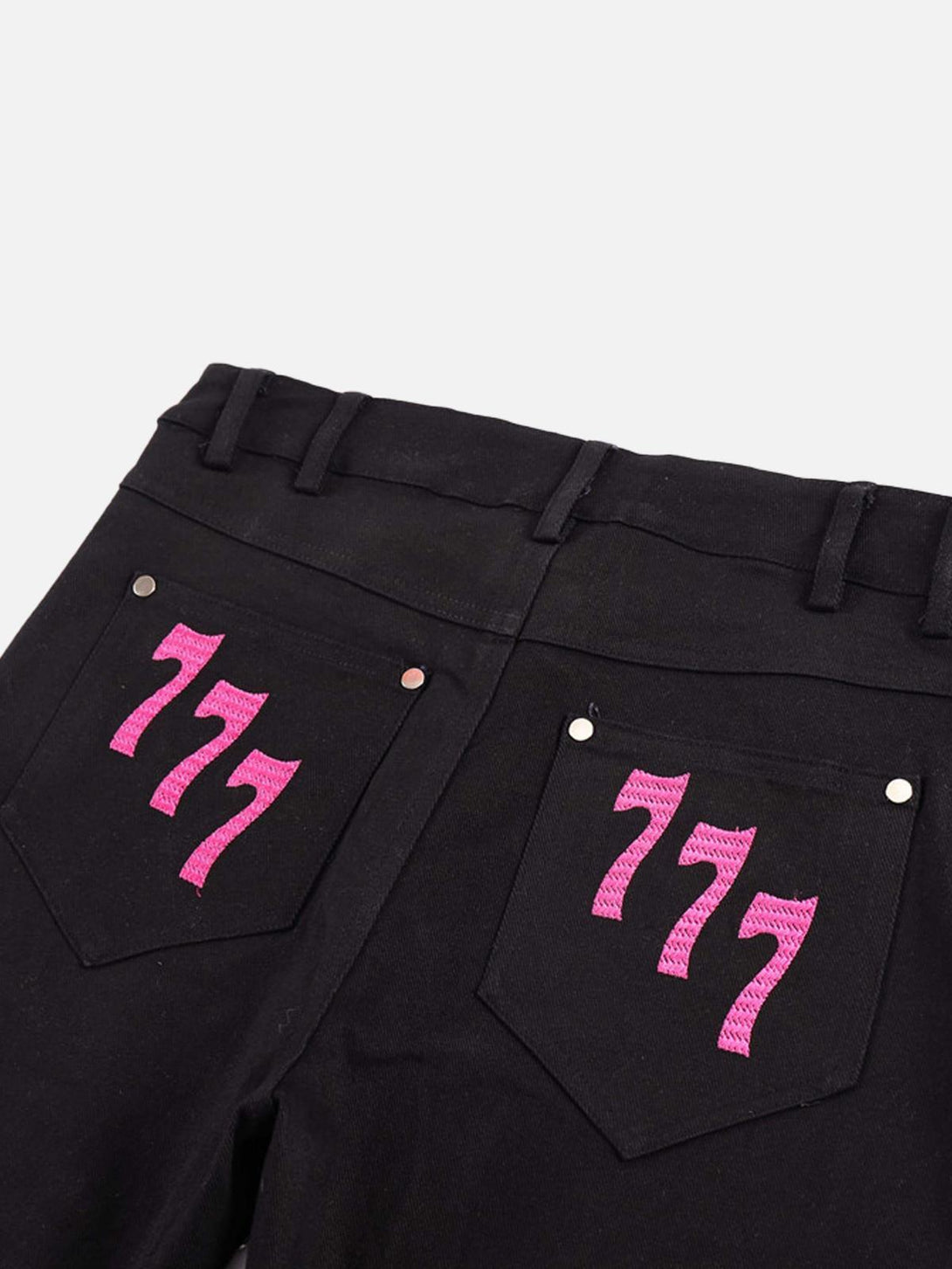Back view of black jeans with pink "777" embroidery, designed by TALISHKO for a bold look.