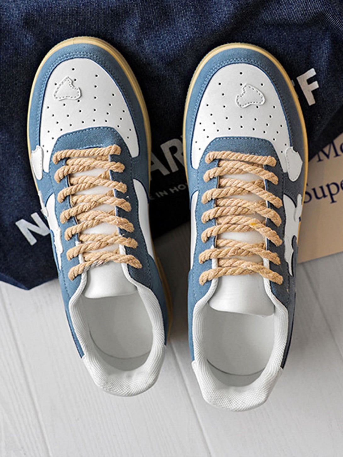 Stylish blue and white retro casual shoes by TALISHKO, showcasing distinctive rope laces.