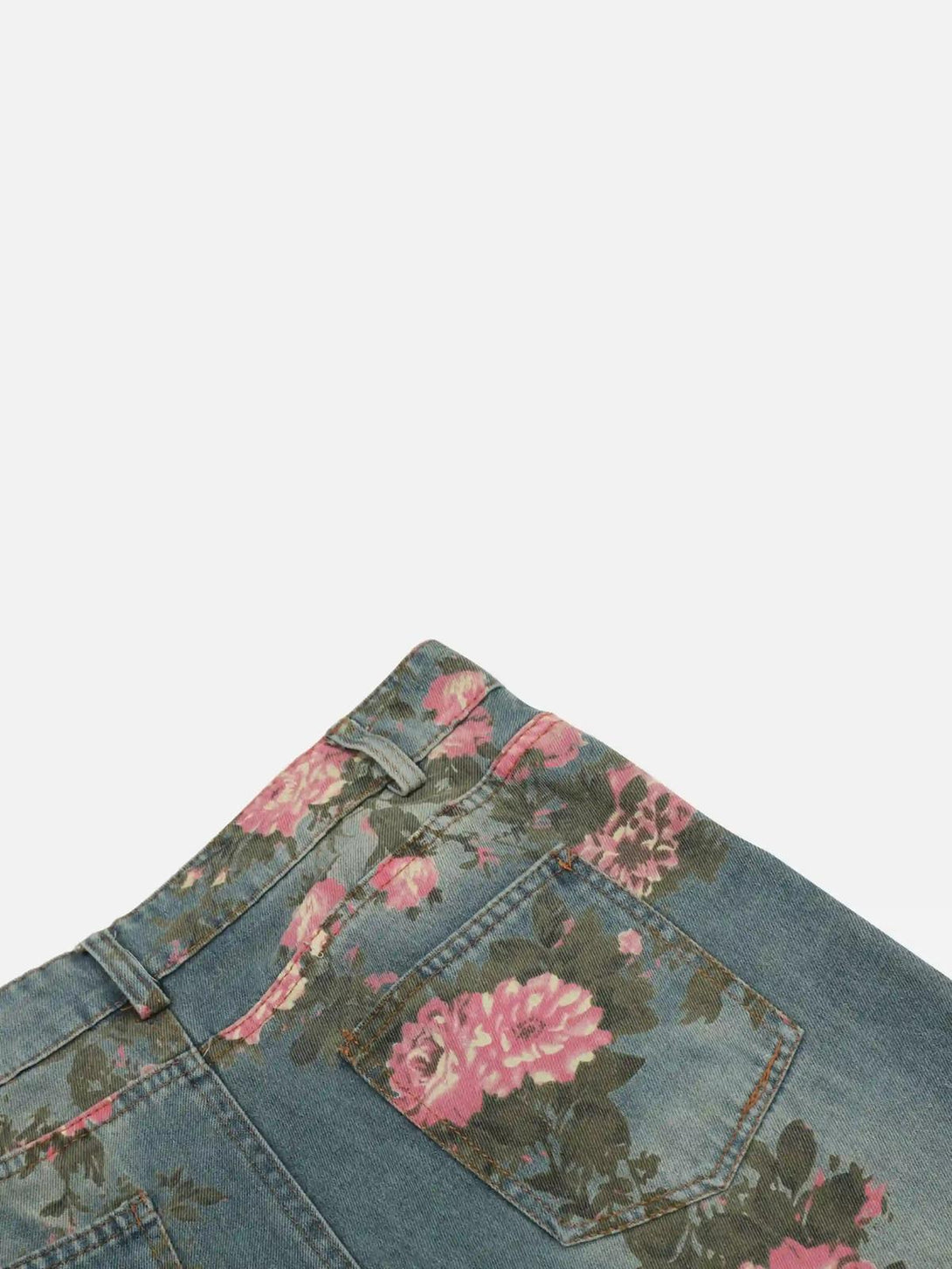 TALISHKO jeans showcasing a vintage floral design on denim, highlighting intricate rose details.