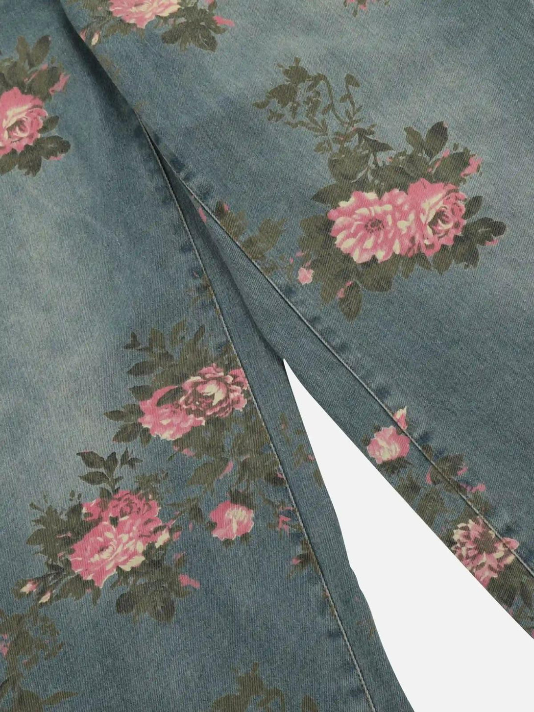 Texture and pattern showcased on TALISHKO's vintage denim with a floral rose design.