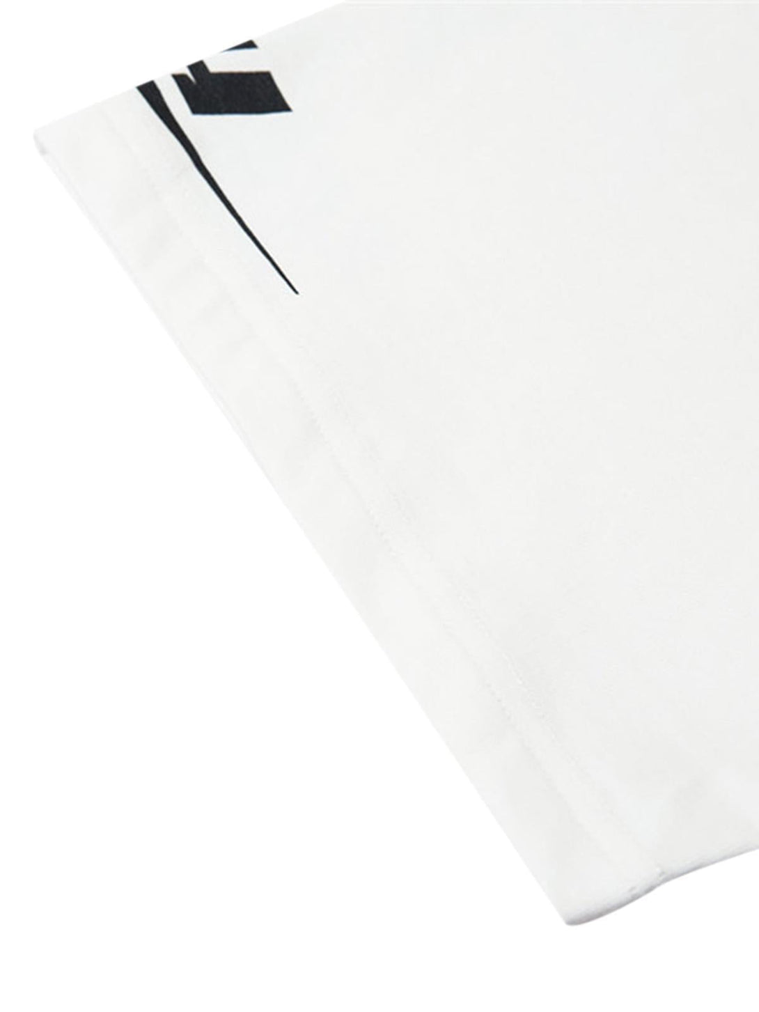 A close-up detail of TALISHKO's vintage lapel T-shirt, highlighting the clean stitching.