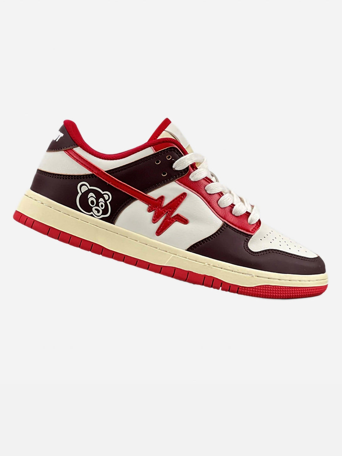 Side view of TALISHKO sneakers in white, red, and brown featuring a playful bear graphic.