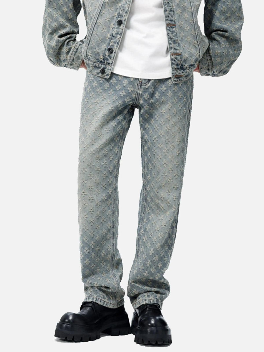 Stylish retro floral jeans by TALISHKO, worn with a jacket, showcasing a unique pattern.