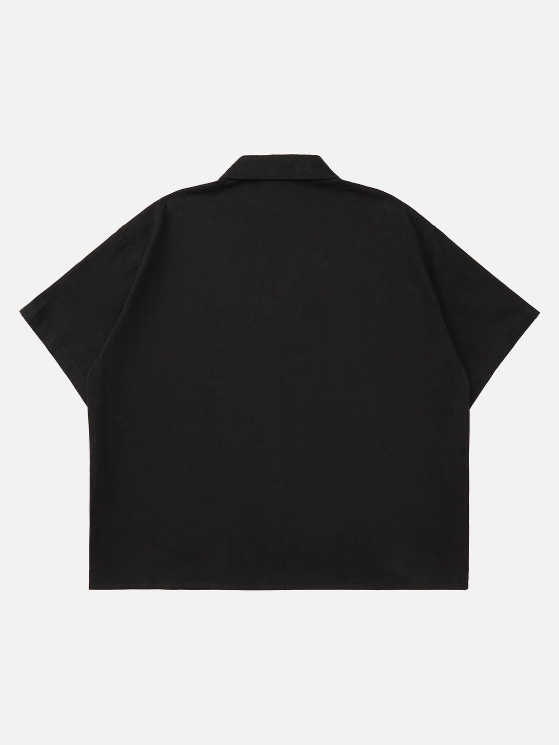 Back view of a black TALISHKO shirt highlighting its relaxed fit and minimalist design.