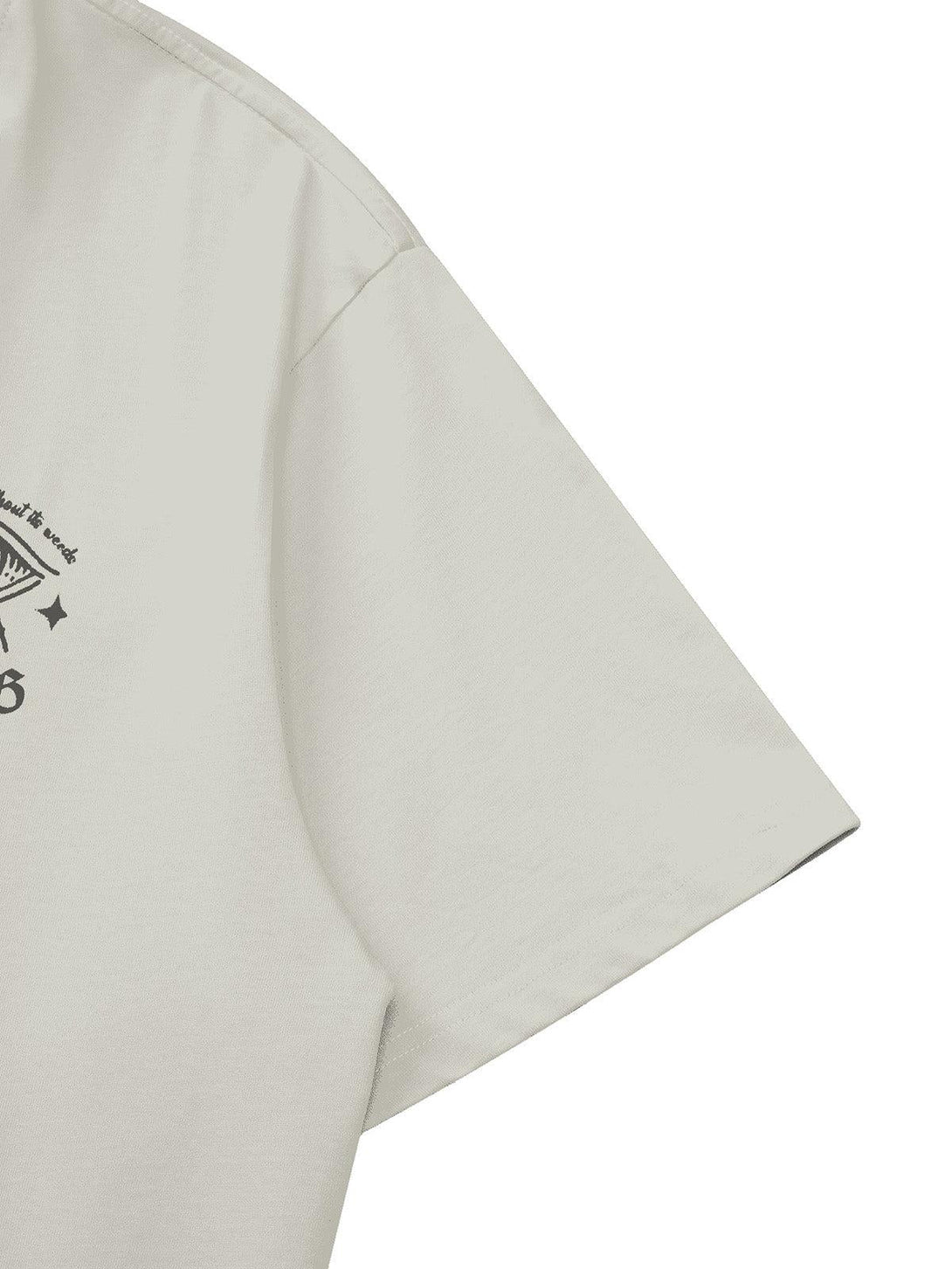 Side view of TALISHKO T-shirt showcasing soft fabric and subtle retro streetwear design.