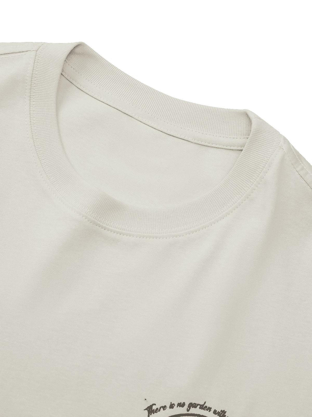 Detailed fabric and stitching on TALISHKO T-shirt, highlighting a casual streetwear vibe.