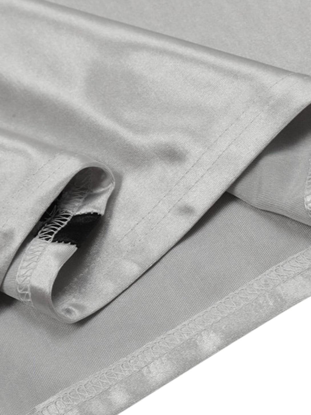 Detailed fabric and stitching of TALISHKO's silver long-sleeved T-shirt.