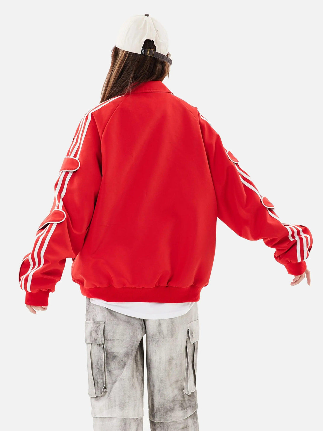 Back view of TALISHKO red sports jacket with white stripes, paired with casual cargo pants.