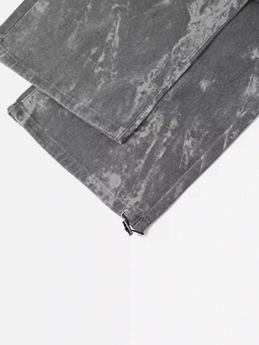 Zoomed-in texture of TALISHKO overalls, highlighting unique wash and detailed craftsmanship.