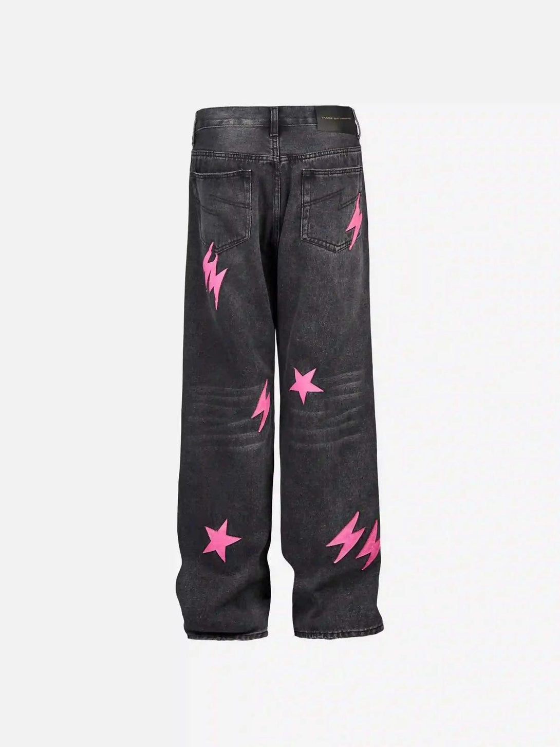 Back view of TALISHKO black jeans with pink lightning bolts and stars for a unique street style.