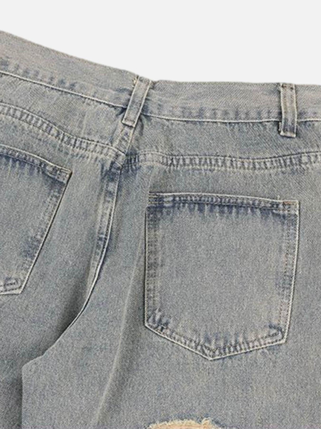 Back view of TALISHKO's American street ripped jeans, showcasing classic pocket design.