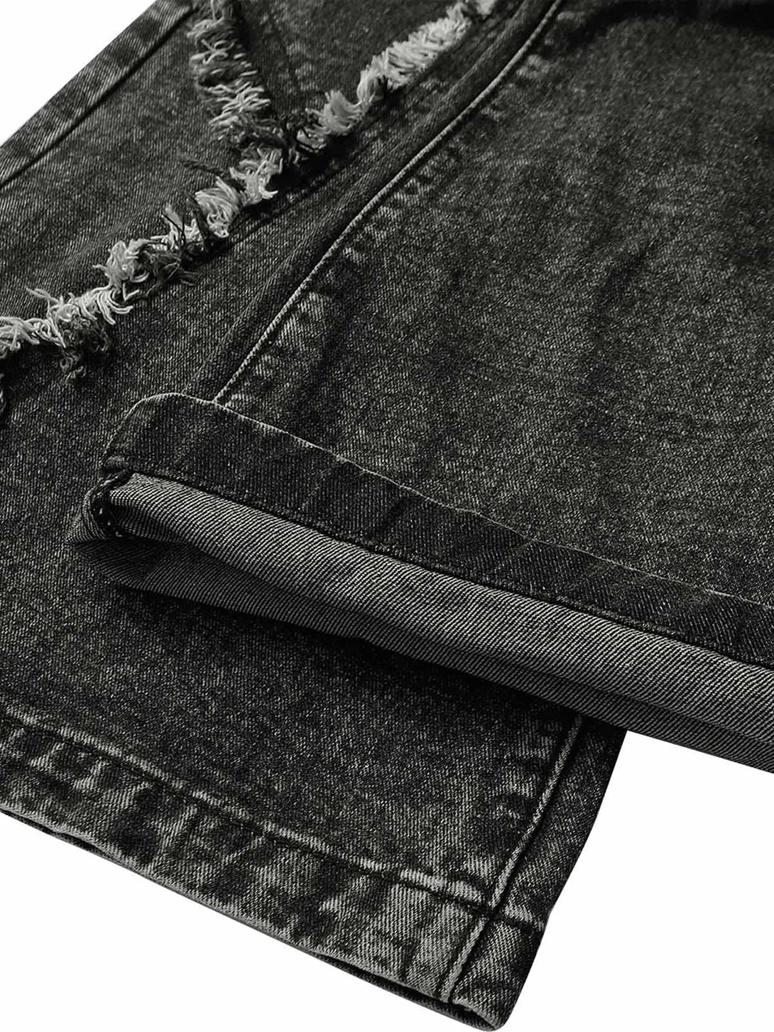 Detailed fabric and stitching of TALISHKO jeans, highlighting their urban street style.