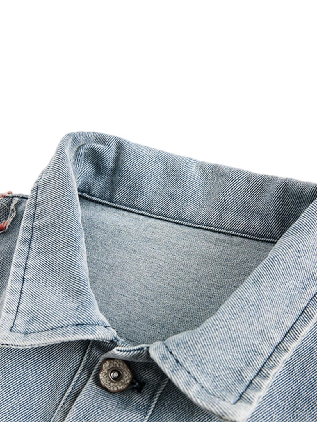 Detailed view of TALISHKO denim jacket collar, highlighting texture and craftsmanship.