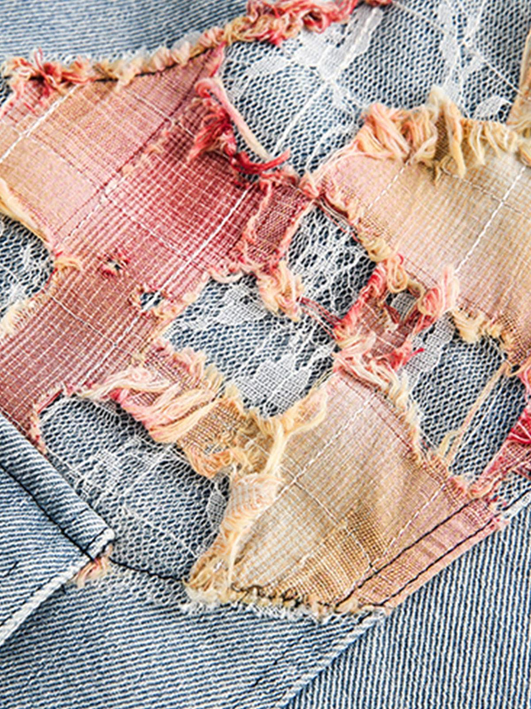 Texture and pattern showcased in TALISHKO denim jacket's colorful lace patchwork detail.