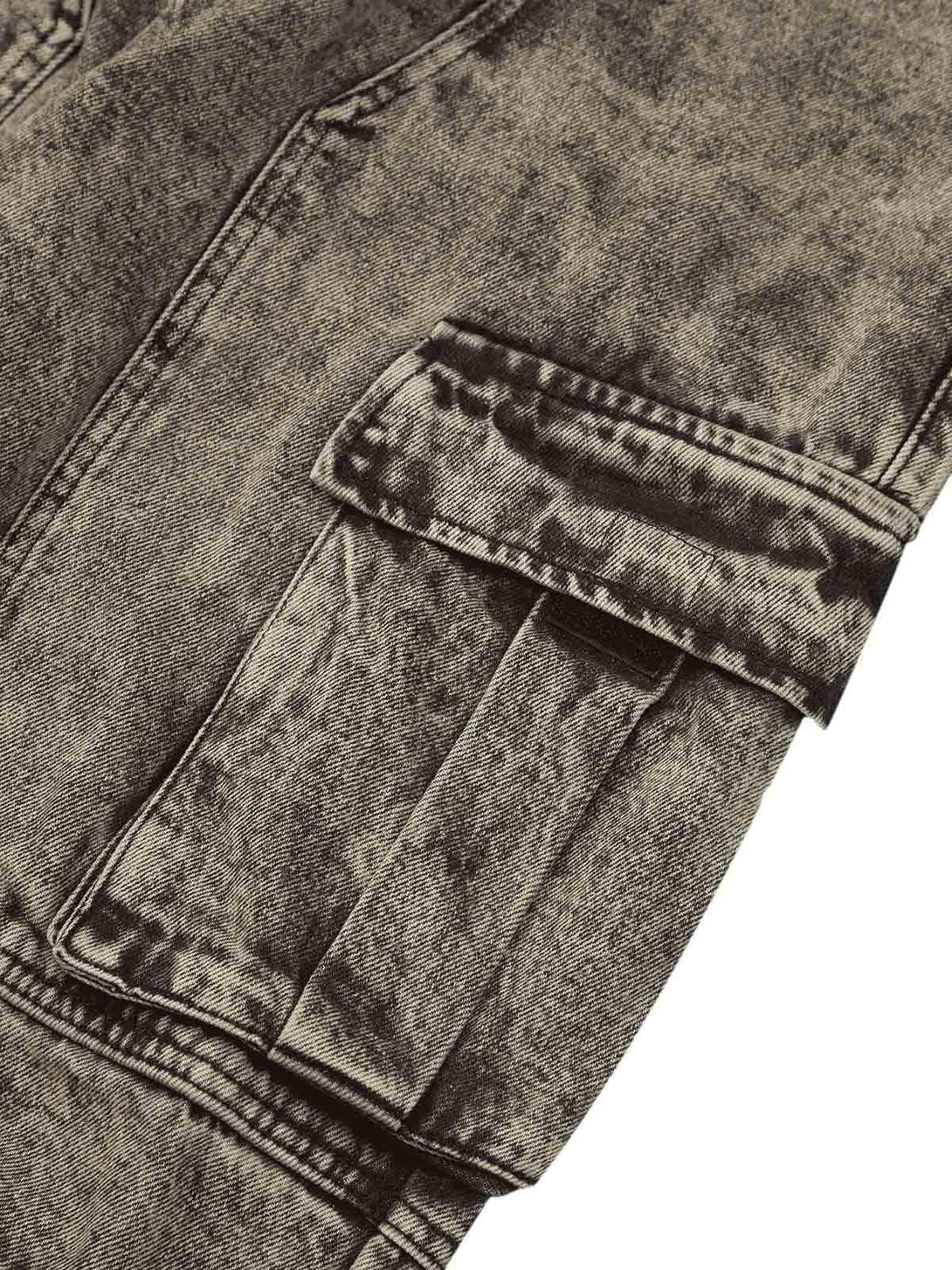 Intricate look at TALISHKO distressed work jeans, highlighting rugged cargo pocket detail.