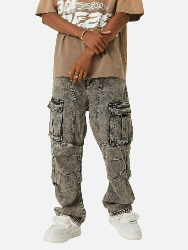 Model wearing TALISHKO distressed work jeans with a casual tee and sneakers for a street style look.