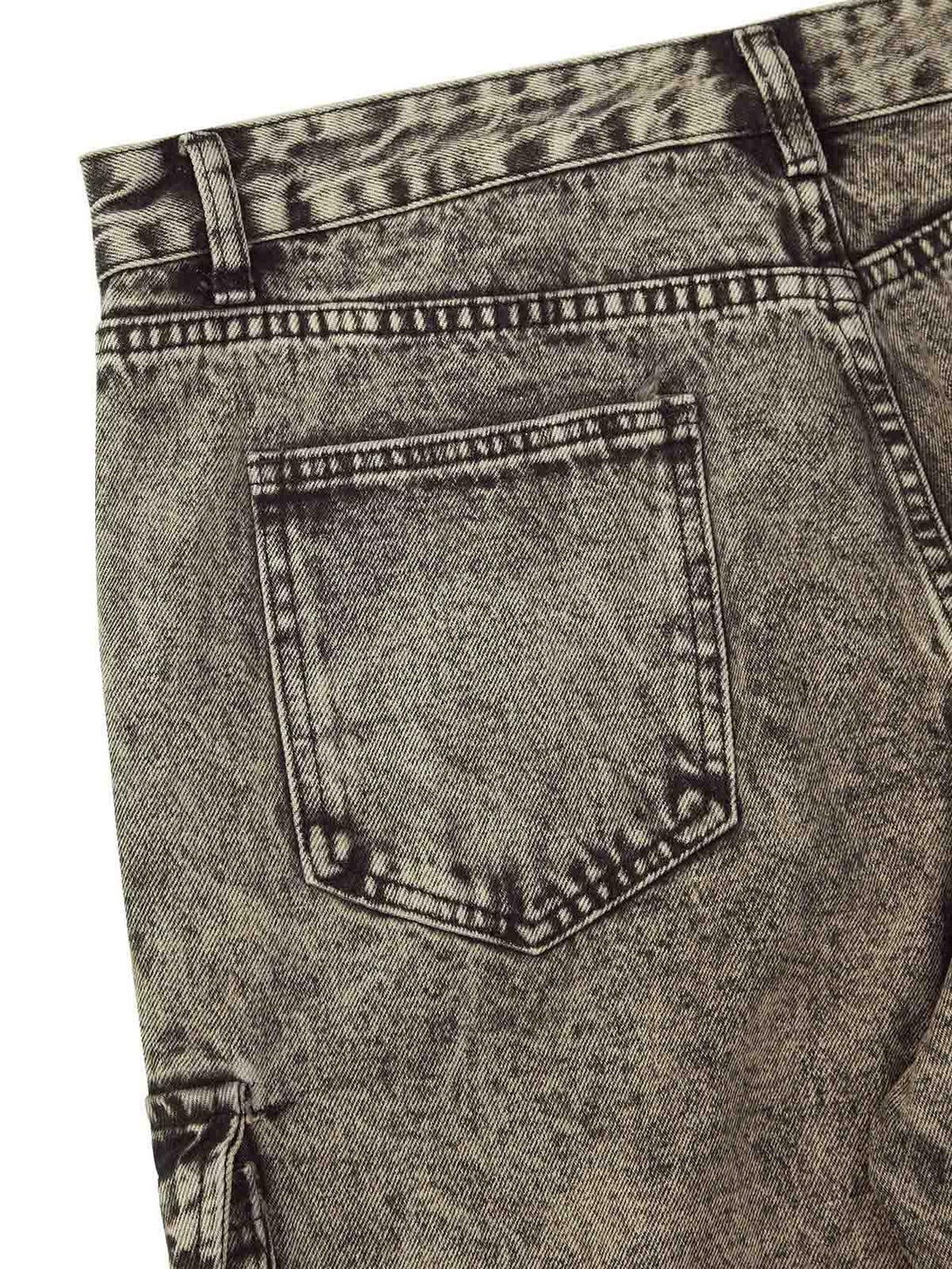 Detailed fabric and stitching of TALISHKO distressed work jeans, showcasing rugged style.