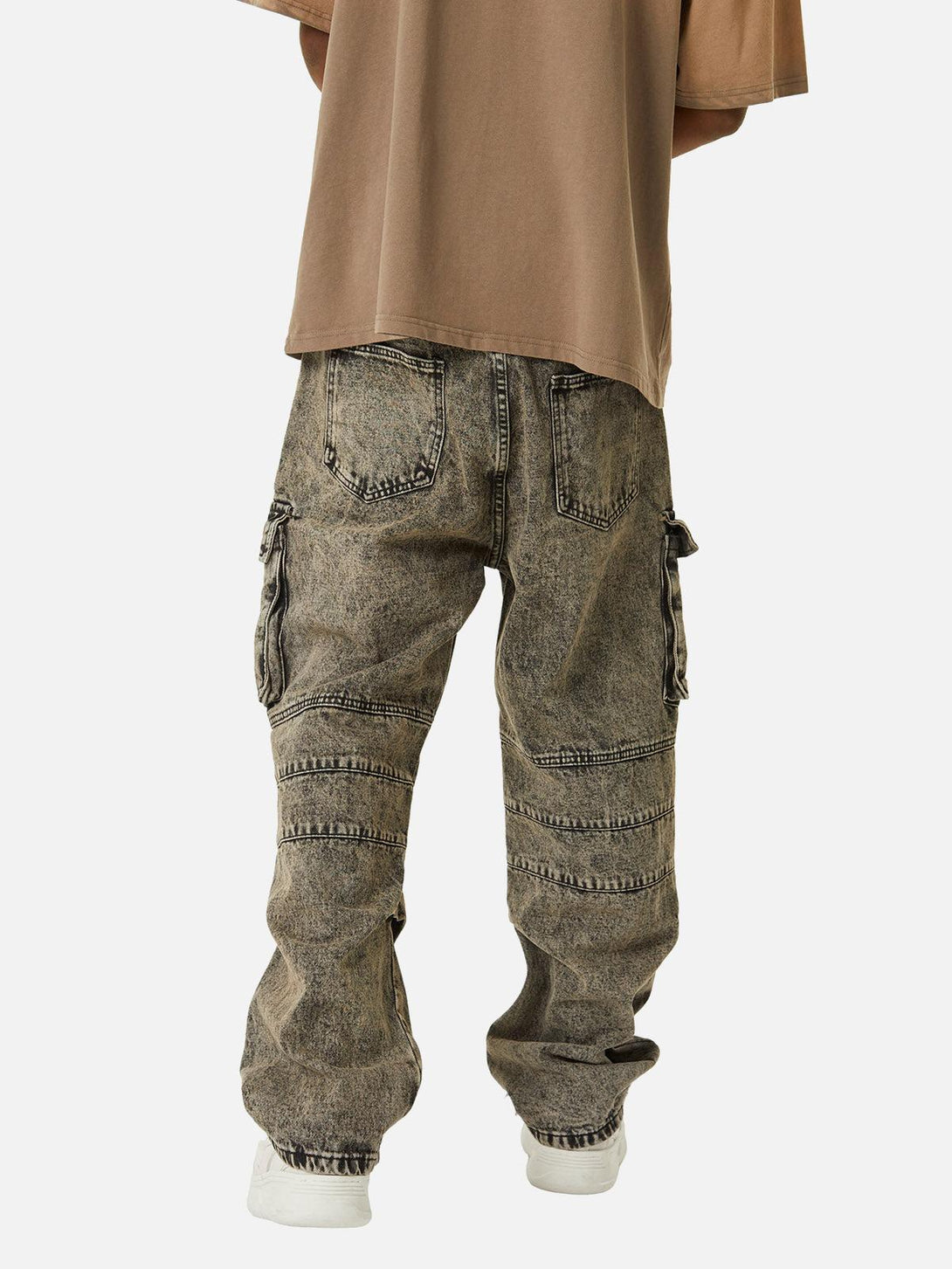 Back view of TALISHKO washed distressed jeans paired with a casual tee for an urban vibe.