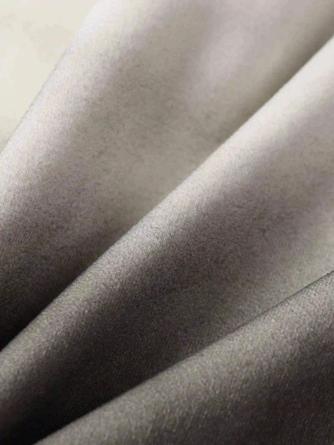 Texture and pattern showcased on TALISHKO's gradient print fabric, highlighting smooth fabric details.