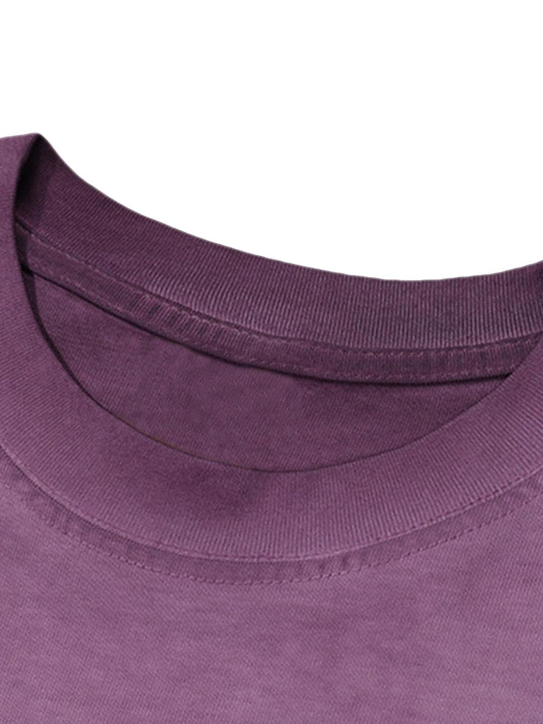 A close-up of the neckline on a purple T-shirt by TALISHKO, highlighting its smooth fabric.