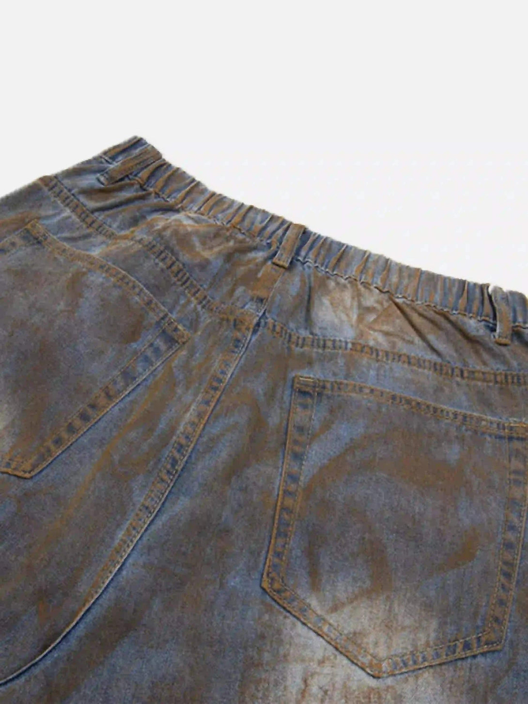 Elastic waistband and pocket detail of TALISHKO's wide-leg denim jorts, showcasing rugged style.