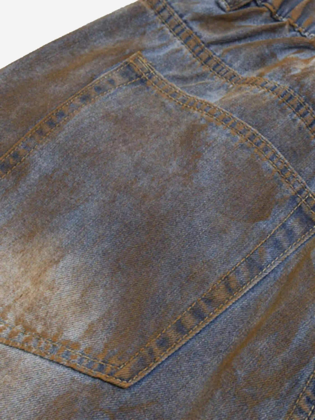 Worn pocket detail of TALISHKO's wide-leg denim jorts, highlighting rugged summer style.