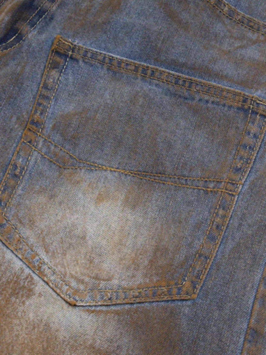 Detailed look at the back pocket of TALISHKO's wide-leg denim jorts, showcasing rugged texture.