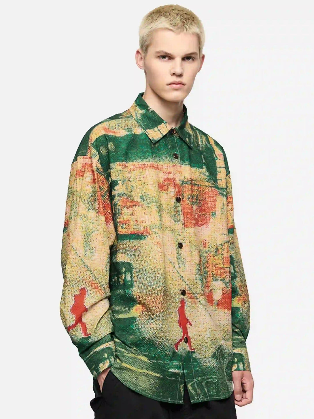 Model wearing a TALISHKO seersucker shirt with abstract urban print in earthy tones.