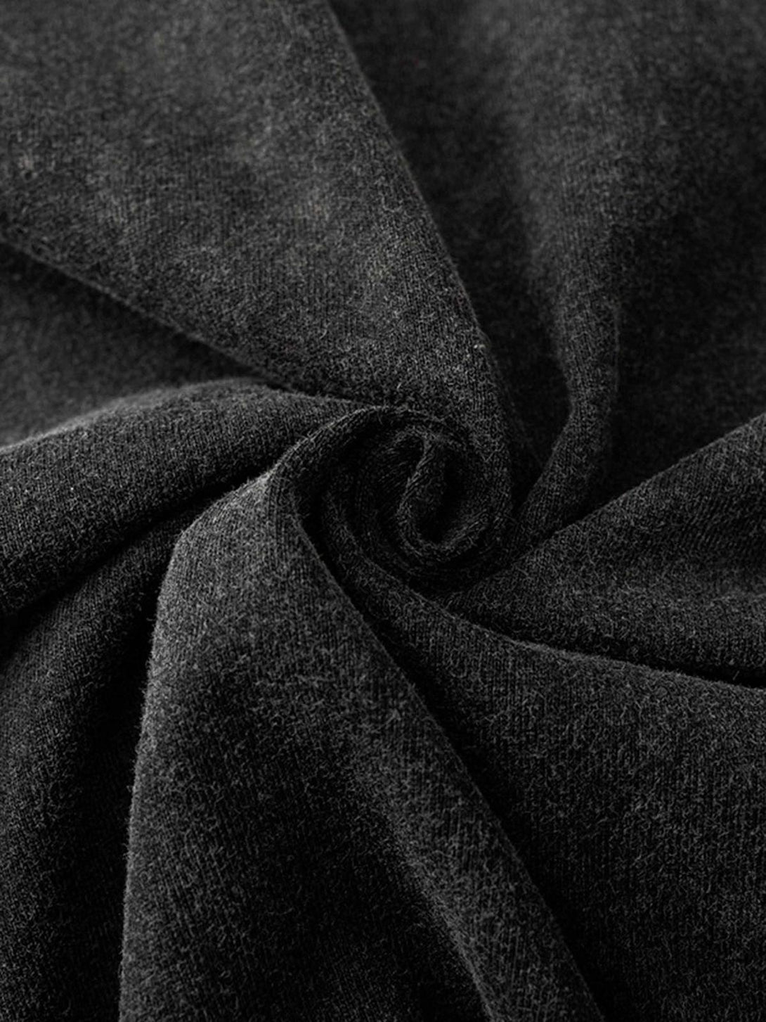 "Zoomed-in texture of the vintage hip-hop T-shirt fabric by TALISHKO, highlighting its quality."