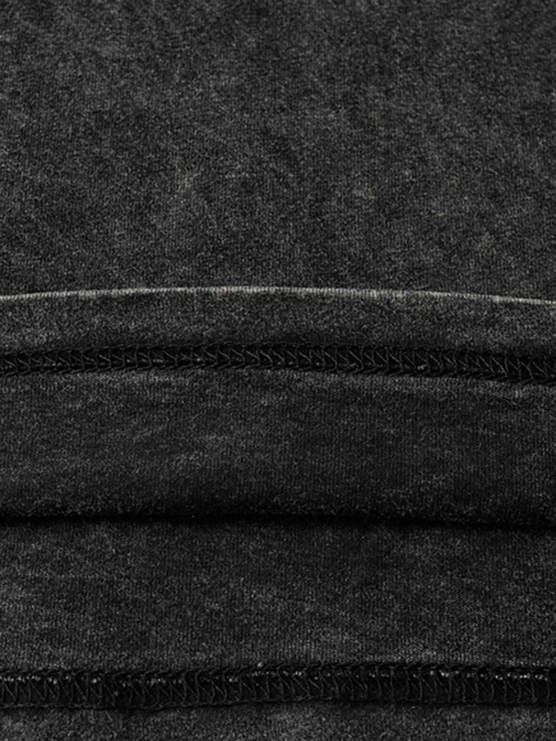 Intricate look at the charcoal fabric texture and stitching on a hip-hop T-shirt by TALISHKO.