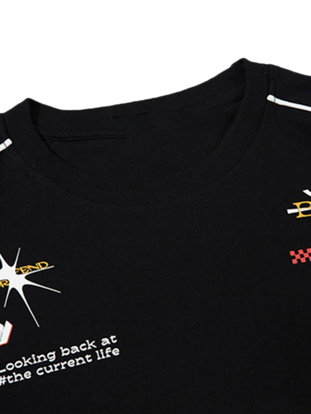 A close-up of a black American Vintage T-shirt featuring graphic details by TALISHKO.