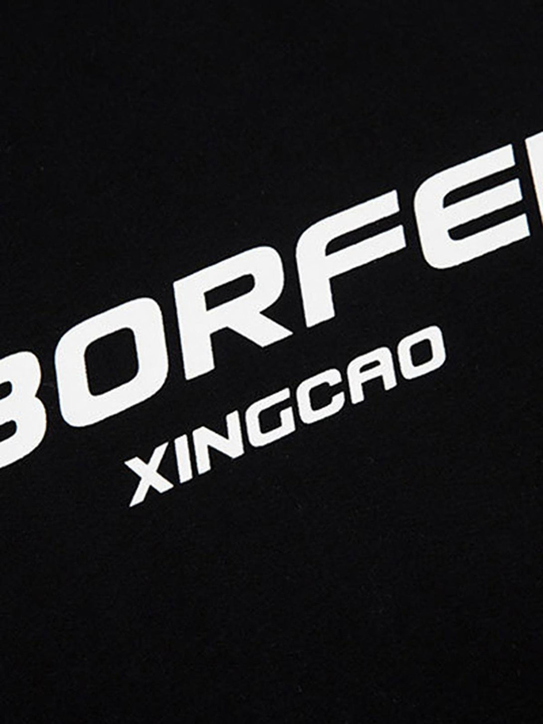 A detailed look at the graphic design on a black American Vintage T-shirt by TALISHKO.