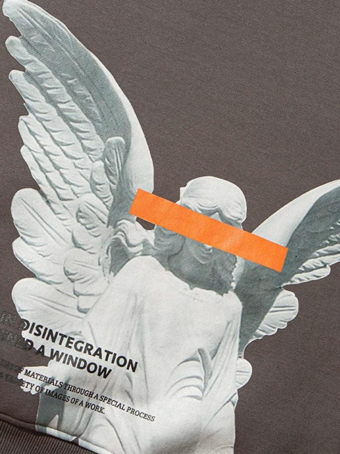 Intricate look at angel graphic detail on a hoodie, designed with modern flair by TALISHKO.