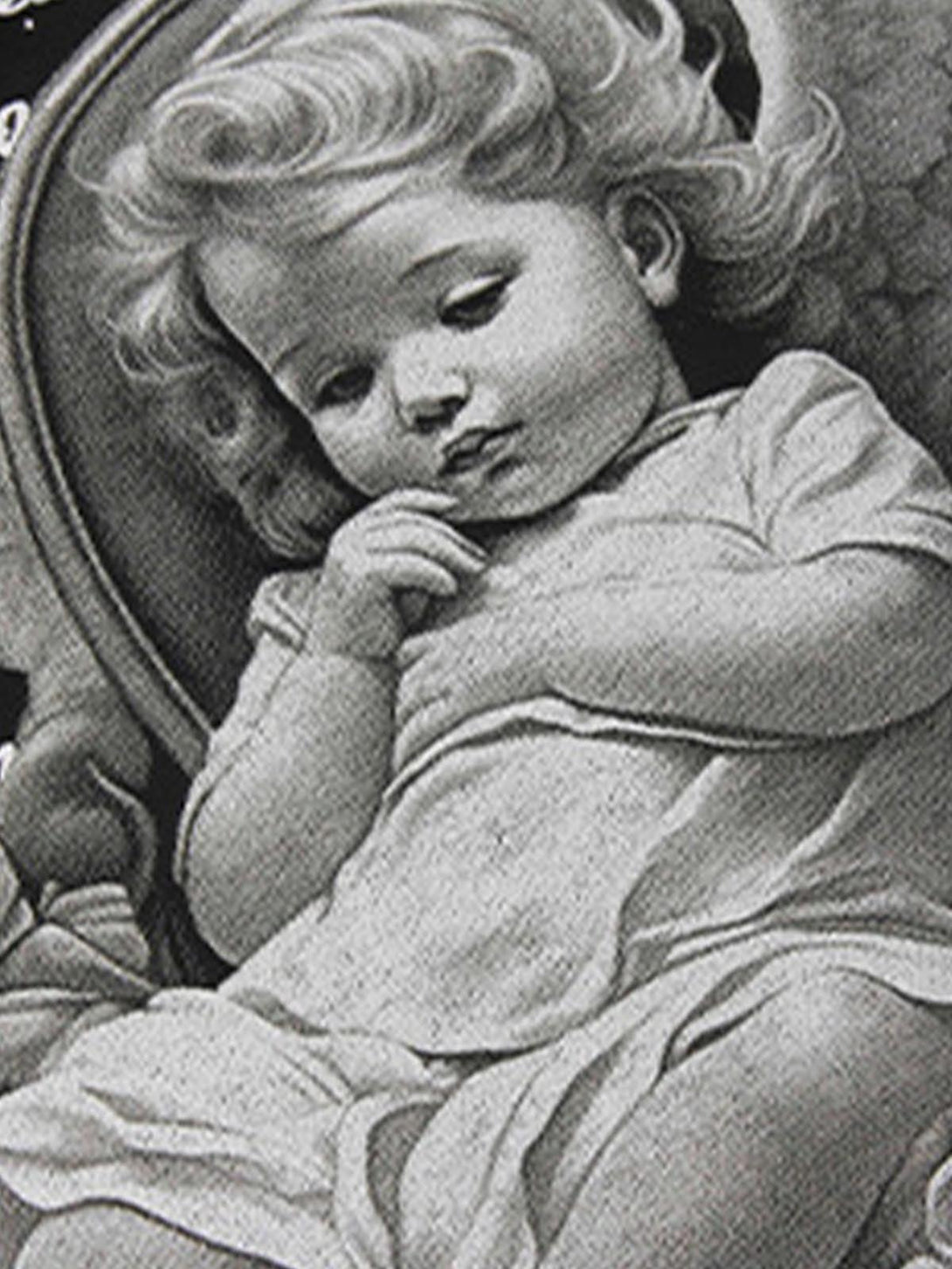 Vintage angel illustration featured on TALISHKO's oversized T-shirt for a timeless style.