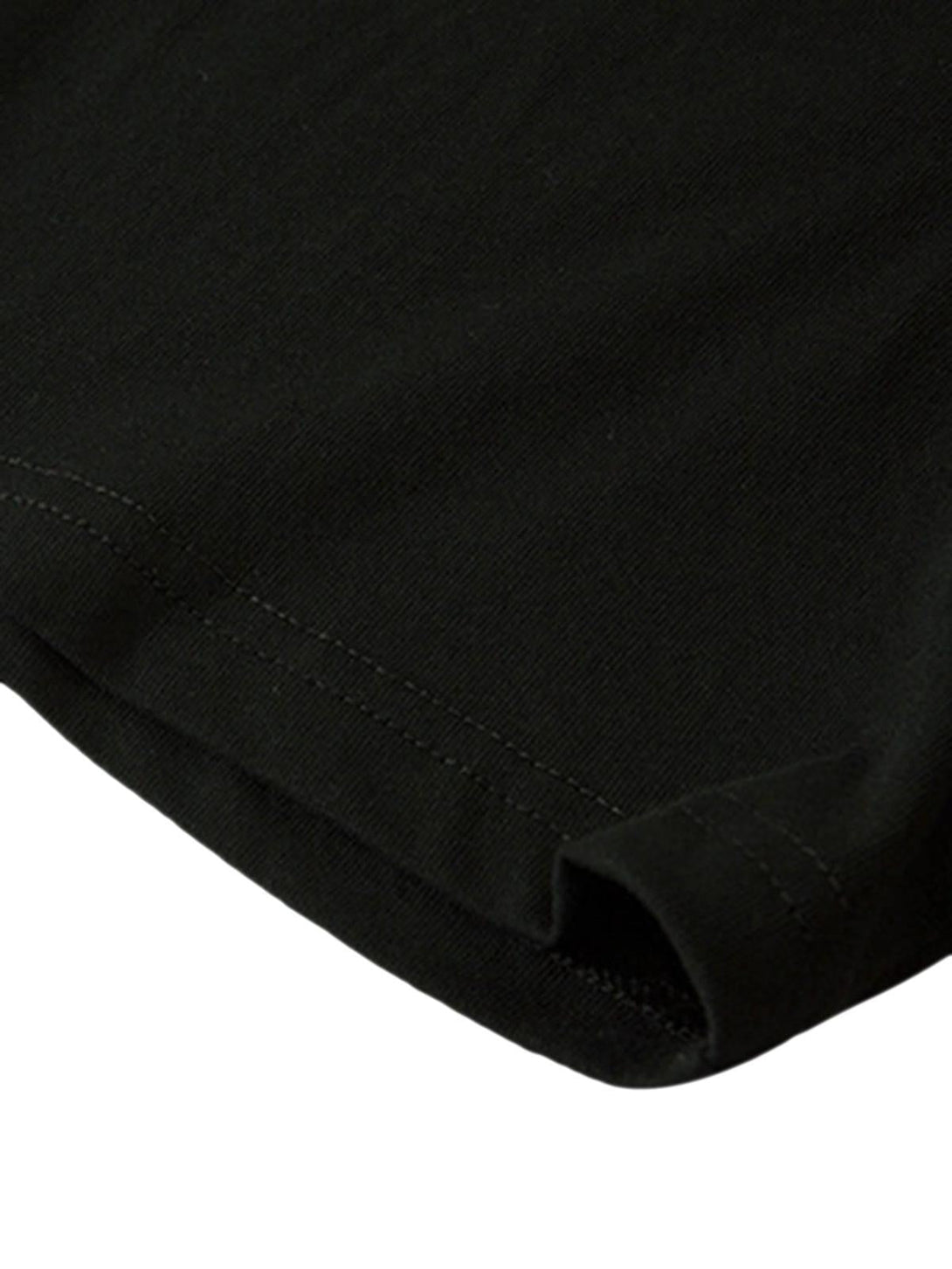 Detailed fabric and stitching of a black T-shirt by TALISHKO, highlighting quality craftsmanship.