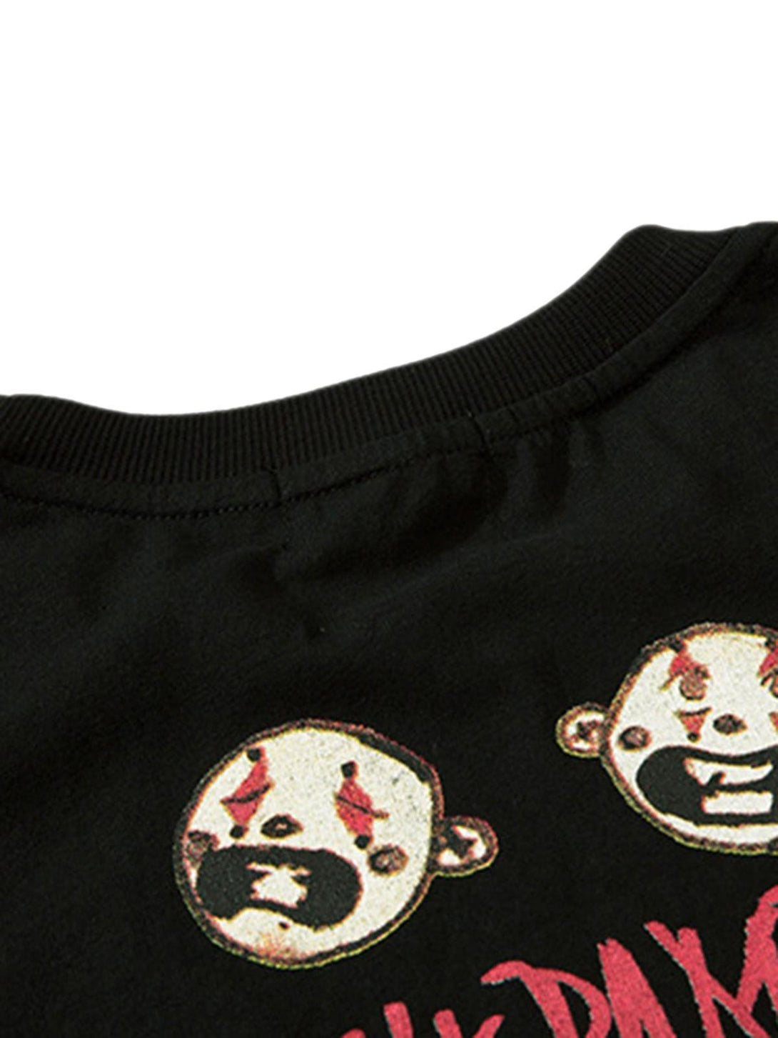 Intricate look at the anime character print on a black T-shirt by TALISHKO, highlighting unique design.