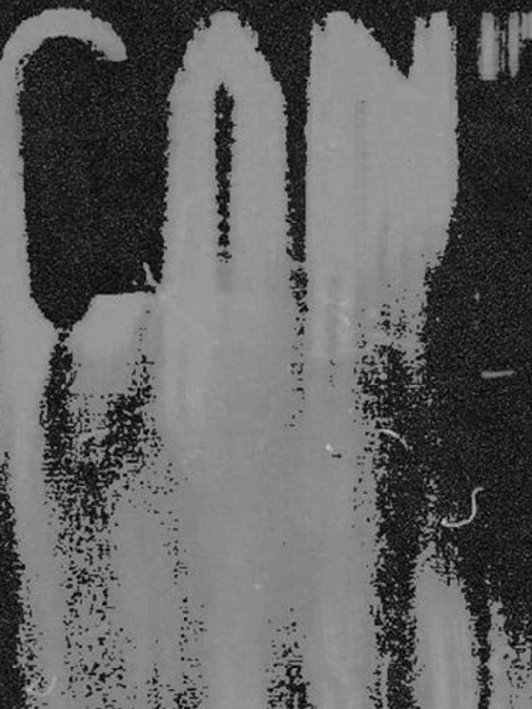 Artistic distressed texture on a vest by TALISHKO, showcasing a unique washed design.