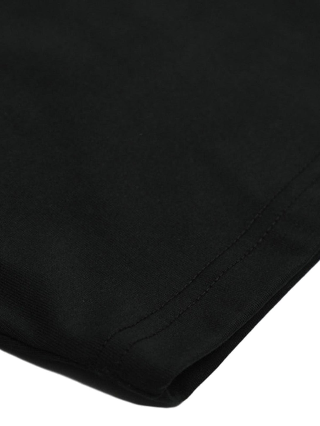 Intricate look at TALISHKO's black T-shirt hem, showcasing fine stitching and fabric detail.