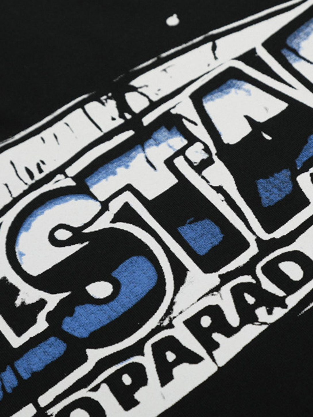 Zoomed-in view of TALISHKO crew neck T-shirt, highlighting bold graphic artwork and texture.