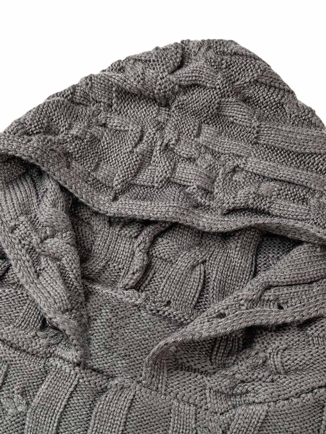 Intricate look at the gray knitted texture of the TALISHKO asymmetric sweater hoodie.